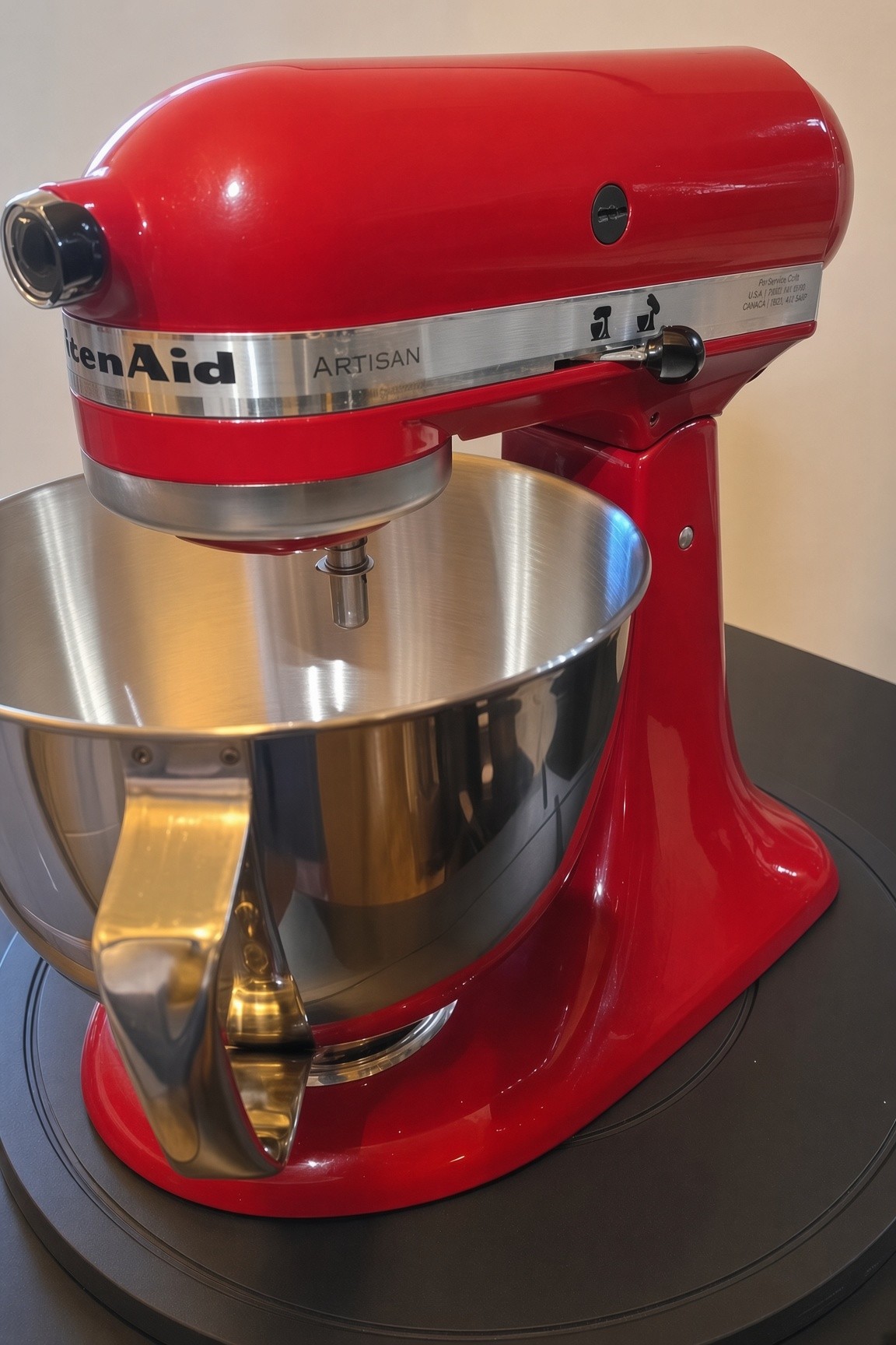 Red KitchenAid Artisan 5-quart tilt-head mixer, serviced