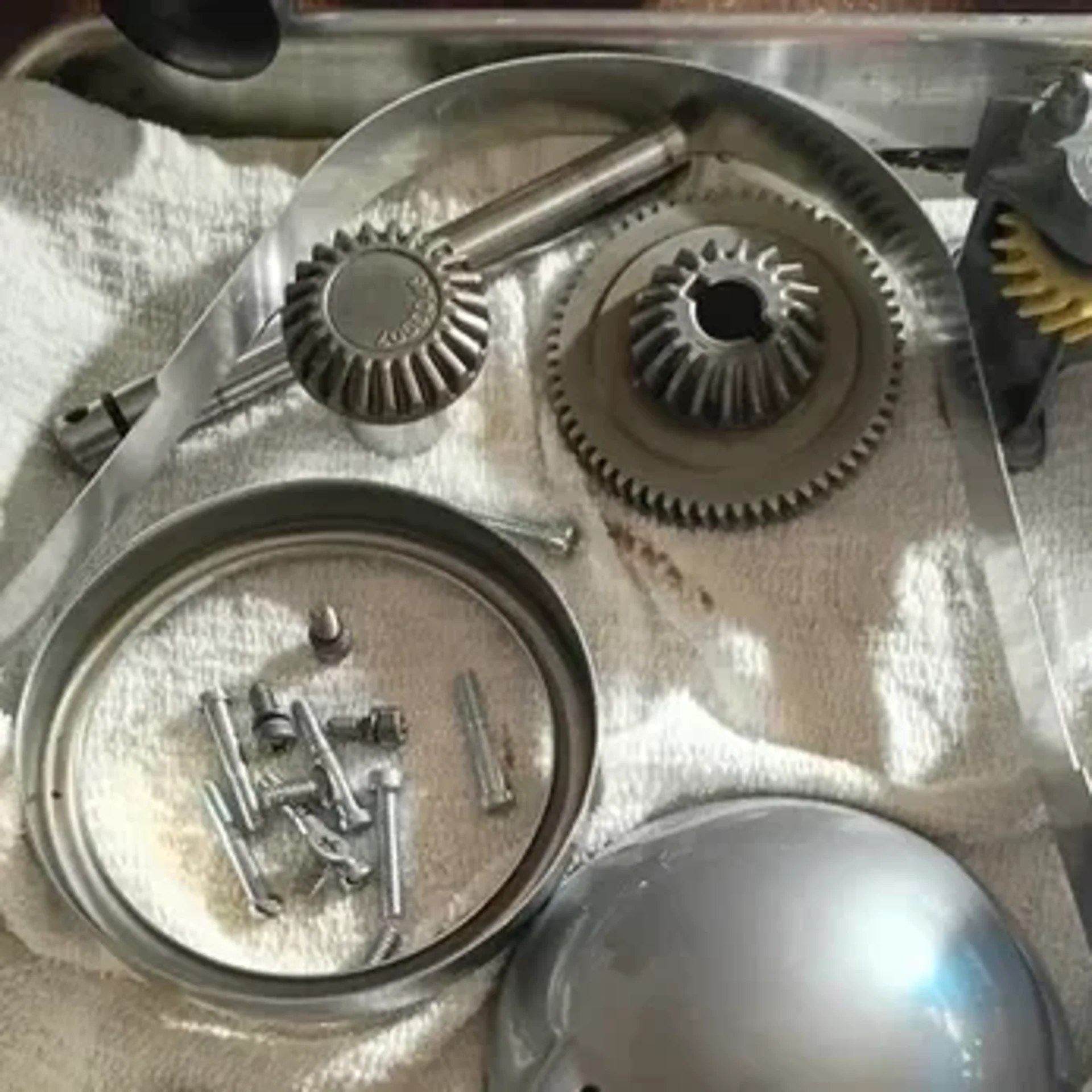 Opened KitchenAid gear housing on the Rochester repair bench